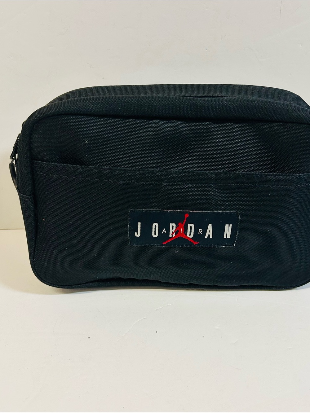 Jordan Black Toiletry Pouch with Red Jumpman Logo